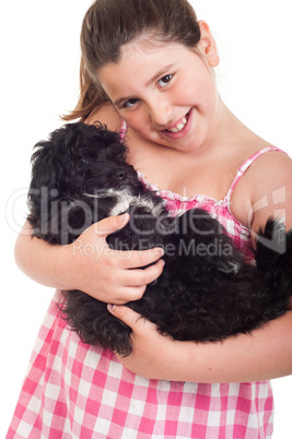 Girl holding dog