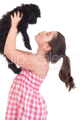 Girl kissing dog