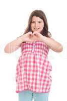 Girl showing heart symbol
