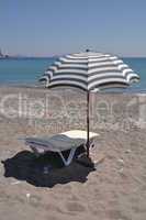 Beach umbrella and chair
