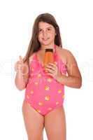 Girl in swimsuit showing thumb up