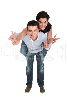 Brother and sister showing victory sign