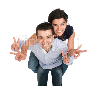 Brother and sister showing victory sign