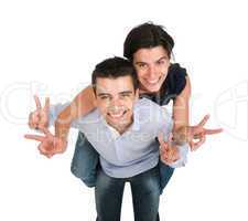Brother and sister showing victory sign
