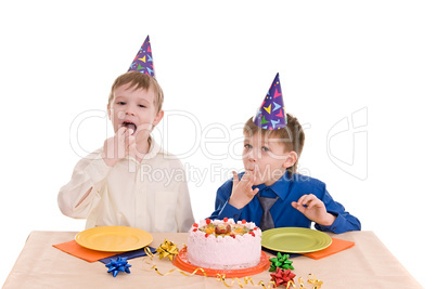 two boy wich cake