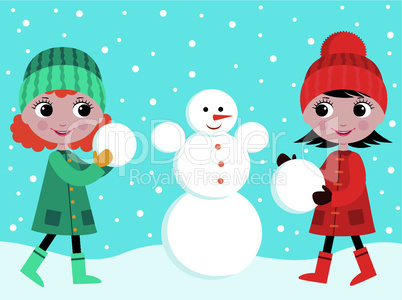 Little girls build the snowman