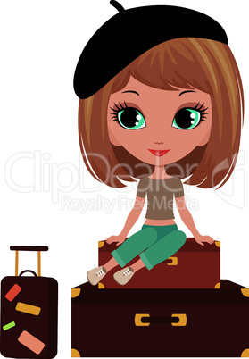 Pretty girl sits on a suitcase