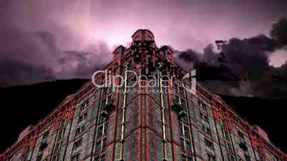 Timelapse lightning strikes behind old derelict victorian warehouse