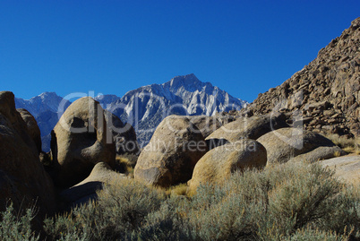 Rocks and high Sierra Nevada peaks, Alabama Hills, California