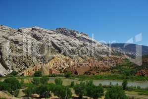 Multicoloured sands and rocks with green River valley, Wyoming