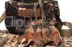 Fowling bag and bird.