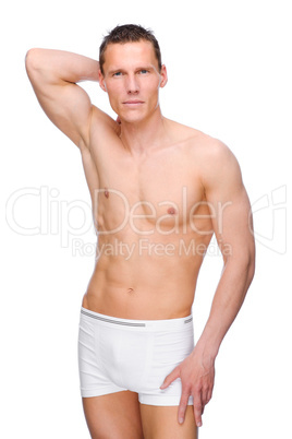 Junger Mann in Unterwäsche