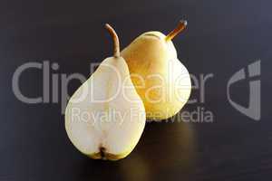 pear lying on a wooden table