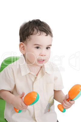 boy with maracas, isolated on white