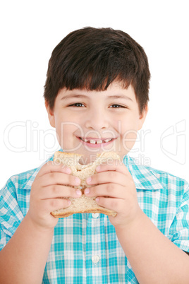 Little boy eating a integral bread, sandwich. isolated on a whit