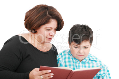 Mother with the son reading the book