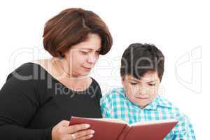 Mother with the son reading the book