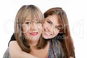 Photo of attractive woman and her young daughter looking at came