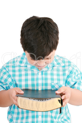 portrait of a boy with a Bible in hand  and prayed