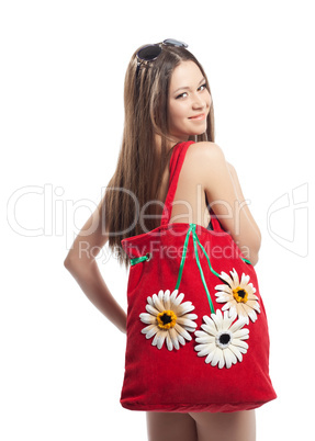Girl portrait with red beach bag isolated