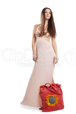 Beauty young woman walk in rose dress