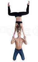 Couple of gymnast show stand on hand