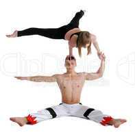 two young acrobats show stand on hand