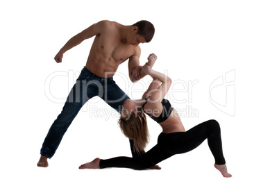 two young acrobats posing in dance