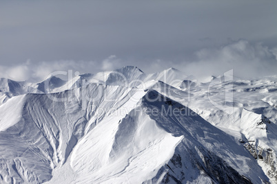 Snowy mountains in haze