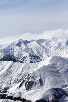 Snowy mountains in haze