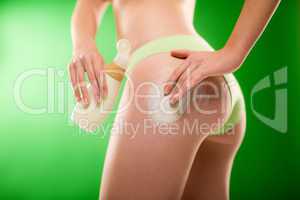 Weight loss woman apply cellulite cream