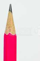Pink graphite pencil isolated on white