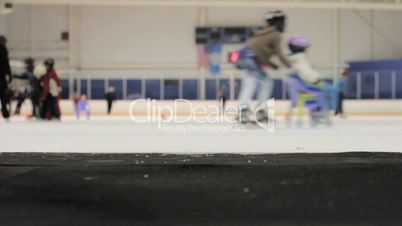 Woman Walks Onto The Ice At The Skating Rink