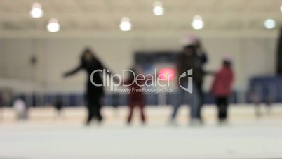 People Skating Off The Ice Rink