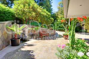 House exterior Front yard with flowers and ceramic tiles