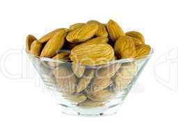 Almond nuts in glass cup isolated