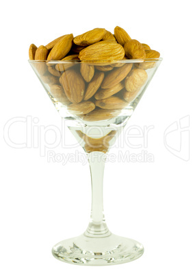 Almond nuts in glass isolated
