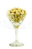 Cashew nuts in a glass isolated on white
