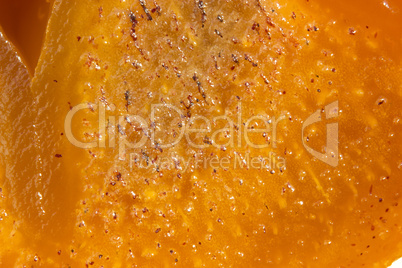 Macro orange yellow persimmon surface