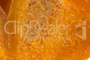 Macro orange yellow persimmon surface