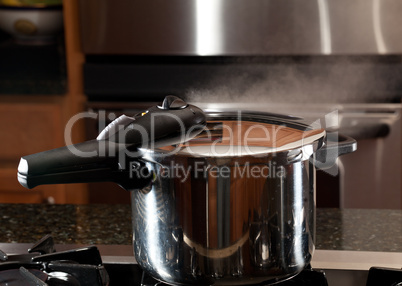 Steam escaping from new pressure cooker pot