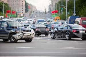 car got in an accident on the background of a large traffic jam