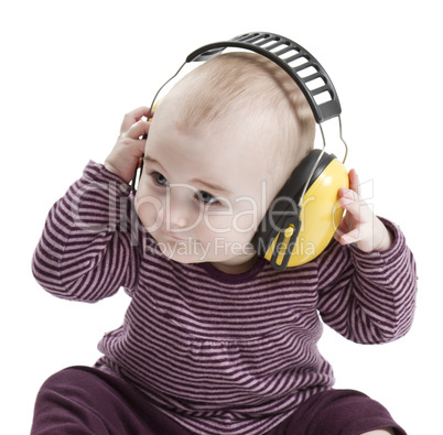 baby with ear protection
