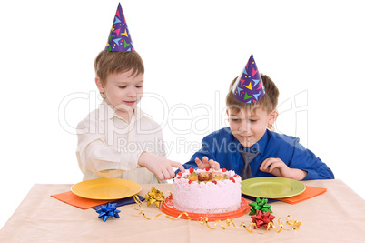 two boy wich cake