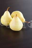pear lying on a wooden table