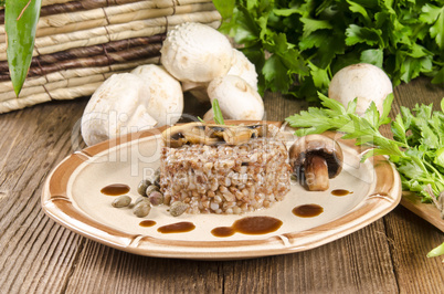 Buckwheats with nut cream and mushrooms