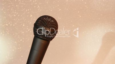 Microphone with gold shadows