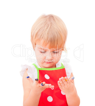 Little girl with paint on her hands