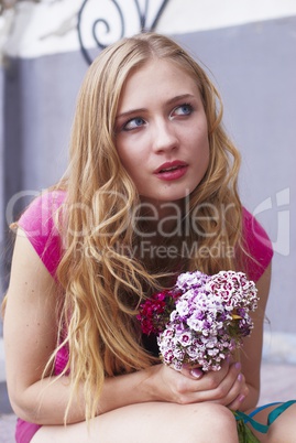 Waiting girl with bouquet