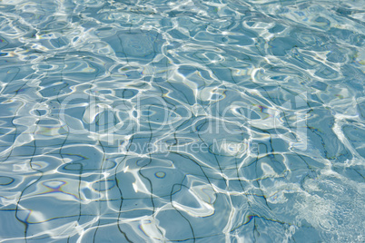 beautiful clear pool water reflecting in the sun